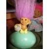 1" Russ Berrie Purple Hair Troll Doll on an Easter Egg view 1