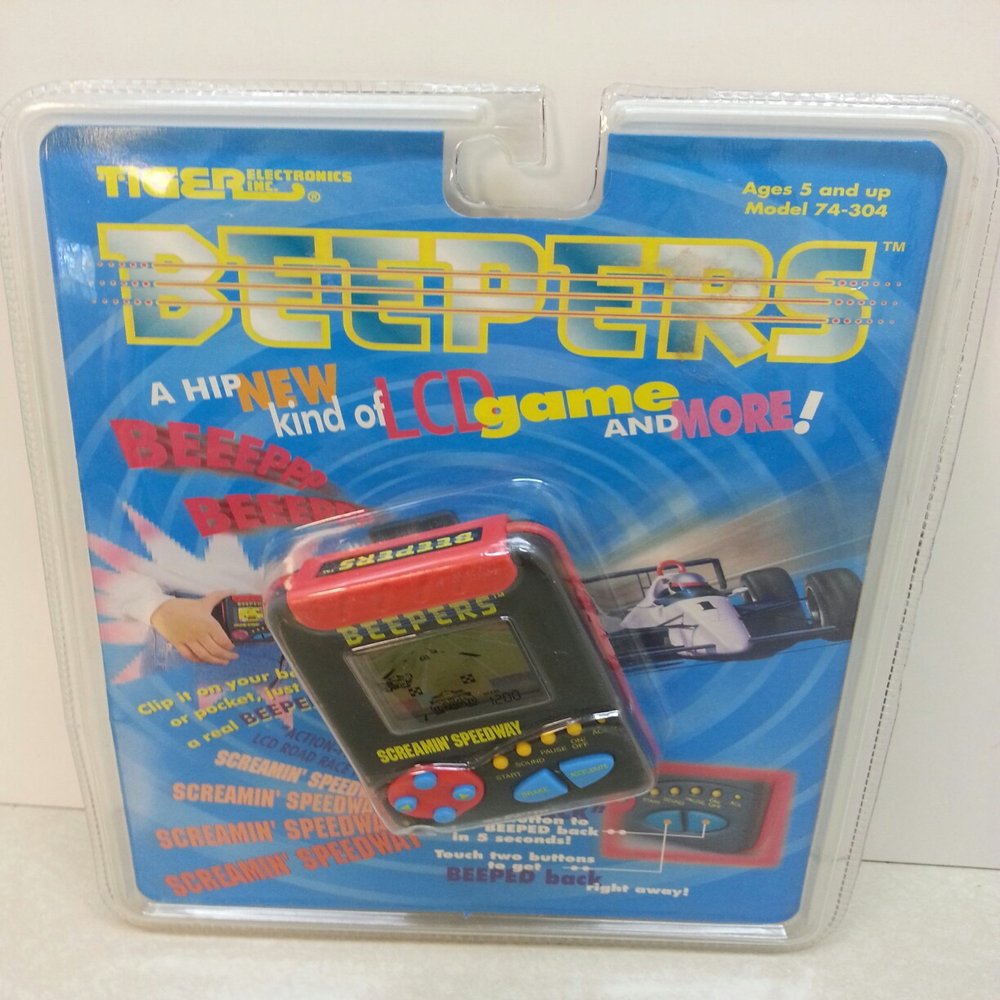 1995 Tiger Electronics, Inc. Tiger Electronics Beepers Screamin' Speedway Pager-like LCD Handheld-Held