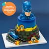 DecoSet Batman to the Rescue Cake Topper, 4 Piece Cake Decoration, Includes Batman Case With a Hidden Fold Out Batmobile Launcher, Free Wheeling Batmobile Car, and Joker and Penguin view 2