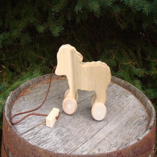 Child Play - Amish handcrafted wooden pull toy lamb, measures approximately 9" l x 7" w x 3" d. Lead-free and unfinished - it is a quality made pull-toy that will be enjoyed for years to come.