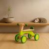 Hape Scoot Around Ride On Wood Bike | Award Winning Four Wheeled Wooden Push Balance Bike Toy for Toddlers with Rubberized Wheels, Bright Green view 3