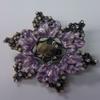 Leaf Design Dreidel in Purple on Antique Brass Metal view 1