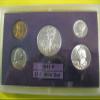 1941 BIRTH YEAR COIN SET- 5 COINS- HALF DOLLAR, QUARTER, DIME, NICKEL, AND CENT, ALL DATED 1941 AND ENCASED IN PLASTIC HOLDER- THESE COINS WILL BE AS GOOD OR BETTER THEN THE PICTURE- view 1