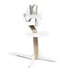 Stokke Nomi High Chair, White/Natural - Inspires Active Sitting - Tool-Free, Seamless Adjustability - Includes Baby Set with Removable Harness for Children 6-24 Months view 1