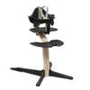 Stokke Nomi High Chair, Black/Natural - Inspires Active Sitting - Tool-Free, Seamless Adjustability - Includes Baby Set with Removable Harness for Children 6-24 Months view 1