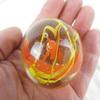 Big Game Toys~Large 2" (50mm) House Party Toe Breaker w/Display Stand Bubble Marble Glass Ball Large Huge Clear/Red/Yellow Confetti Ribbon Shooter Swirl view 1