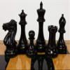 4 Queens Black Anderssen Staunton Wood Chess Set 3 3/4" King with Walnut and Birdseye Maple Color Board view 3