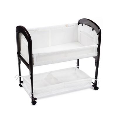 Arms Reach Cambria Co-Sleeper Bedside Bassinet Featuring Height-Adjustable Legs, Curved Wooden Ends, Breathable Mesh Sides with Pockets, and Large Lower Storage Basket, Espresso and White