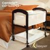Arms Reach Cambria Co-Sleeper Bedside Bassinet Featuring Height-Adjustable Legs, Curved Wooden Ends, Breathable Mesh Sides with Pockets, and Large Lower Storage Basket, Espresso and White view 2