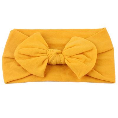 AKOAK 1 Pack Solid Color Skin-friendly Baby Headband Elastic Soft Nylon Headband Cute Baby Bow Headband (Yellow)