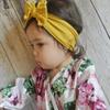 AKOAK 1 Pack Solid Color Skin-friendly Baby Headband Elastic Soft Nylon Headband Cute Baby Bow Headband (Yellow) view 2