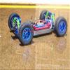 GPM For Traxxas Rustler 4X4 VXL (67076-4) Upgrade Parts Front & Rear Aluminum Shocks + Steel #45 Axles + Spring Steel Hex + Rubber Tires With Metal Rim (Low Center Of Gravity Set) - 68Pc Set Green view 4