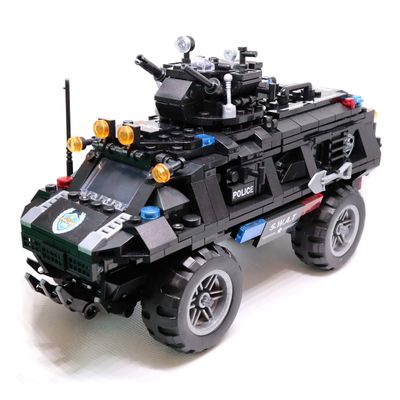 QXB Swat Police Truck Armored Tactical Transport Vehicle Building Blocks (549 PCS)