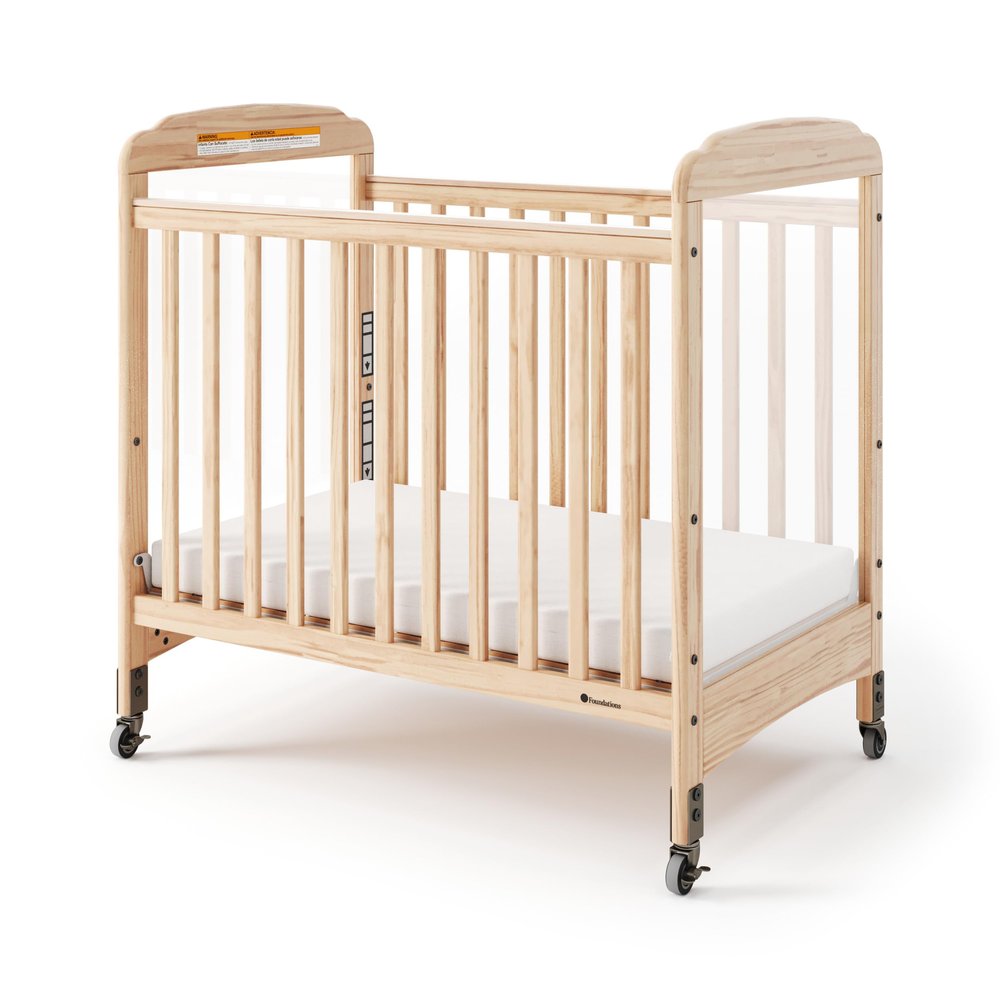 Foundations Serenity Compact Clearview Daycare Crib, Fixed Side, Durable Wood Construction, Adjustable Mattress Board, Clear End Panels. Includes 3 InfaPure Foam Mattress (Natural)