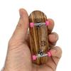 Teak Tuning 32mm Pro Fingerboard Complete - Fully Assembled with Pro Level Components - Pro Shaped Wooden Deck (32x97mm), UltraSpin Bearing Wheels, Prodigy Gen2 Trucks - Pink Zebra view 1
