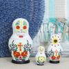 Ebros 3 Piece Set Day of The Dead Sugar Skulls Spirit Skeletons Nesting Dolls Matroyshka Babushka Figurines 6" Tall Ossuary Macabre Halloween Accent (White) view 1