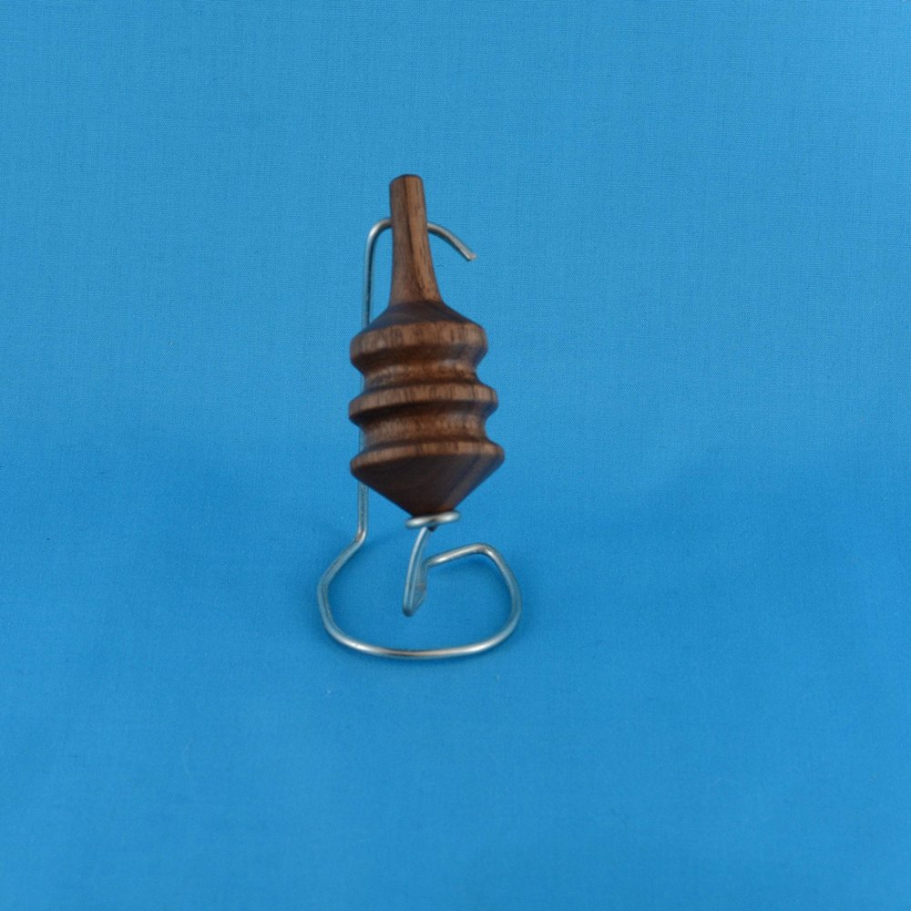 Wood spinning Top