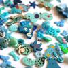 TomToy Blue I Spy Trinkets for Rainbow I Spy Bottle/Bag, Colorful Miniatures, Mixed Buttons, Beads, Charms, 1-3cm, Set of 50 view 1
