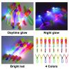 Rocket Slingshot Flying with LED Lights Glow The Dark Party,12 Launchers + 12 LED Helicopters,Slingshot Amazing Arrow Helicopter Glow Supplies for Kids (24 Pieces) view 3