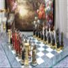 Ebros Gift Historical Themed Chess Set Egyptian Ptolemaic Pharaoh Army VS Augustus Caesar Roman Empire Centurions Resin Sculpted Chess Pieces with Checker Frosted Glass Board Gaming Set view 2
