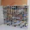 DisplayGifts Clear Acrylic Display Case for 1:64 Scale Hot Toy Cars Wheels Model Cars Display with 144 Compartments in 45 Degree Angle, Clear, UV Protect 22.5 X 30.4 X 3 Inches, Wall Mounted Storage view 3