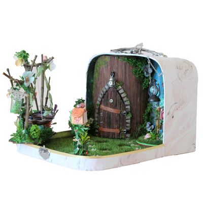 Fairy room in the suitcase. Miniature dollhouse forest diorama 1:12 scale. Tiny magical