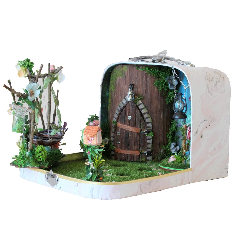 Fairy room in the suitcase. Miniature dollhouse forest diorama 1:12 scale. Tiny magical