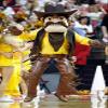 SPOTSOUND Cowboy REDBROKOLY Mascot in traditional clothes view 1