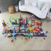 Hot Wheels City Toy Car Track Set Downtown Repair Station Playset with 1:64 Scale Vehicle, Working Lift & Launcher view 2