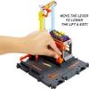 Hot Wheels City Toy Car Track Set Downtown Repair Station Playset with 1:64 Scale Vehicle, Working Lift & Launcher view 4