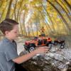 NKOK Realtree 1/18 Scale Free-Wheel Playsets 10-PC Set, RT Jeep Wrangler w/ Polaris Sportsman on Trailer & Accessories playset (Roof Rack, Hunter, Helmet, 2 Ducks, Shot Gun, Shotgun Case) view 3