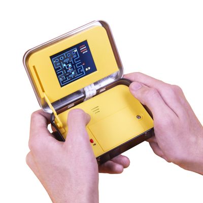 PAC-Man Arcade Game in a Tin. Full Colour 8-bit Game with Original Sounds & Graphics. Classic PAC-Man Gameplay. Includes 2.4 Screen. Officially Licensed PAC-Man Merchandise.