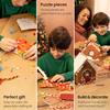 Arteza Kids Cardboard Gingerbread House Kit, 324 Pieces, Fun Kids' Activities  3D Holiday Crafts with Glitter, Chenille Stems, & Pom Poms for Christmas Decorating and Playtime view 3