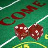 19mm Craps Dice Pair Matching Serial Numbers - Authentic Las Vegas Casino Table-Played Dice (Texas Station (Red Frosted) Bold Lettering) view 3