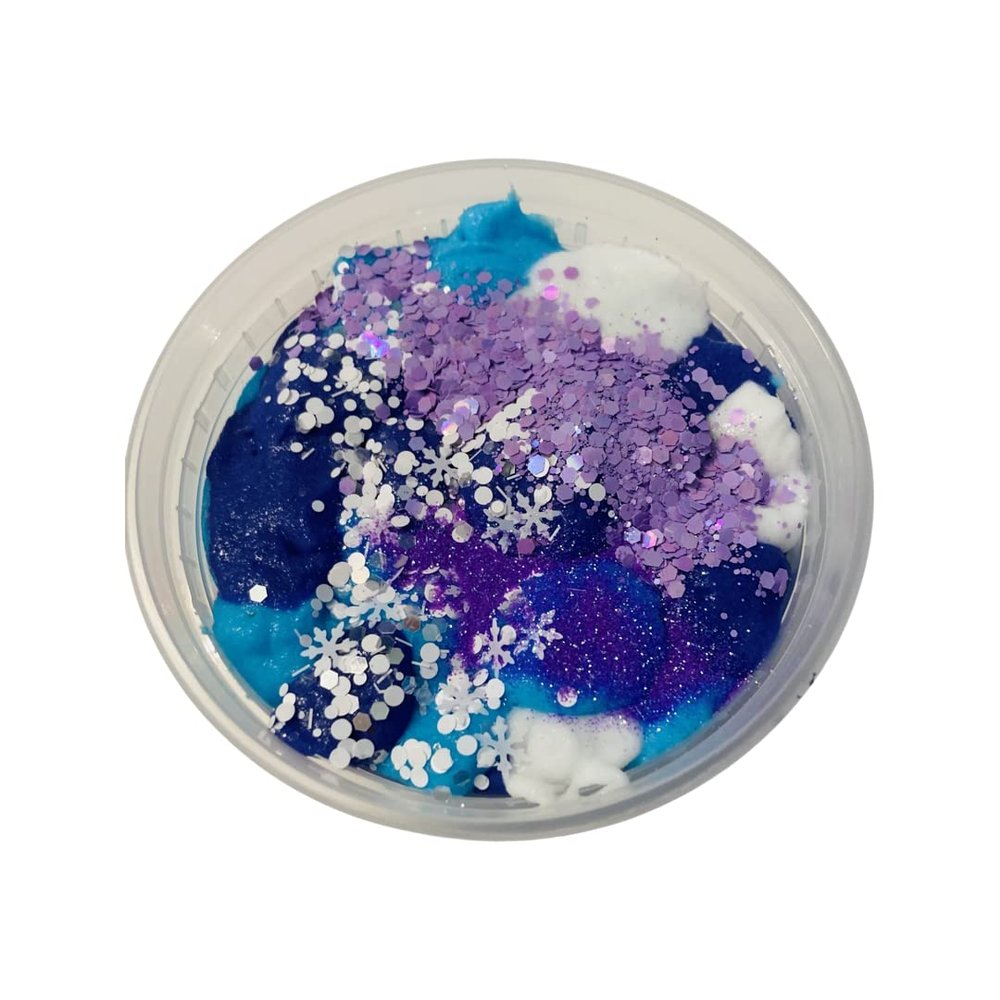 Wasatch Winter Snow is a fabulous home made cloud slime scented like coconut ice cream. The color blend is stunning in blue white and purple topped with fabulous glitter and a cloud charm.