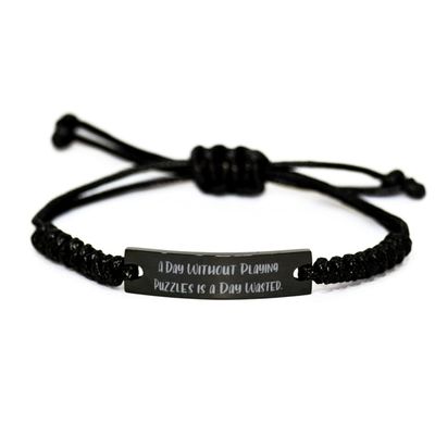 A Day Without Playing Puzzles is a Day Wasted. Black Rope Bracelet, Puzzles Engraved Bracelet, Sarcastic Gifts for Puzzles