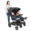 Joovy Kooper RS2 Lightweight Travel Double Stroller Featuring Dual Snack Trays, One-Handed Fold, Multi-Position Reclining Seats, Adjustable Leg Rests, and 2 Zippered Pockets for Storage view 1