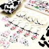 Chunful 148 Pcs Cow Party Favors Include Cow Print Gift Bag Cute Keychain Elastic Silicone Bracelets Animal Stickers for Birthday Party Supplies view 2