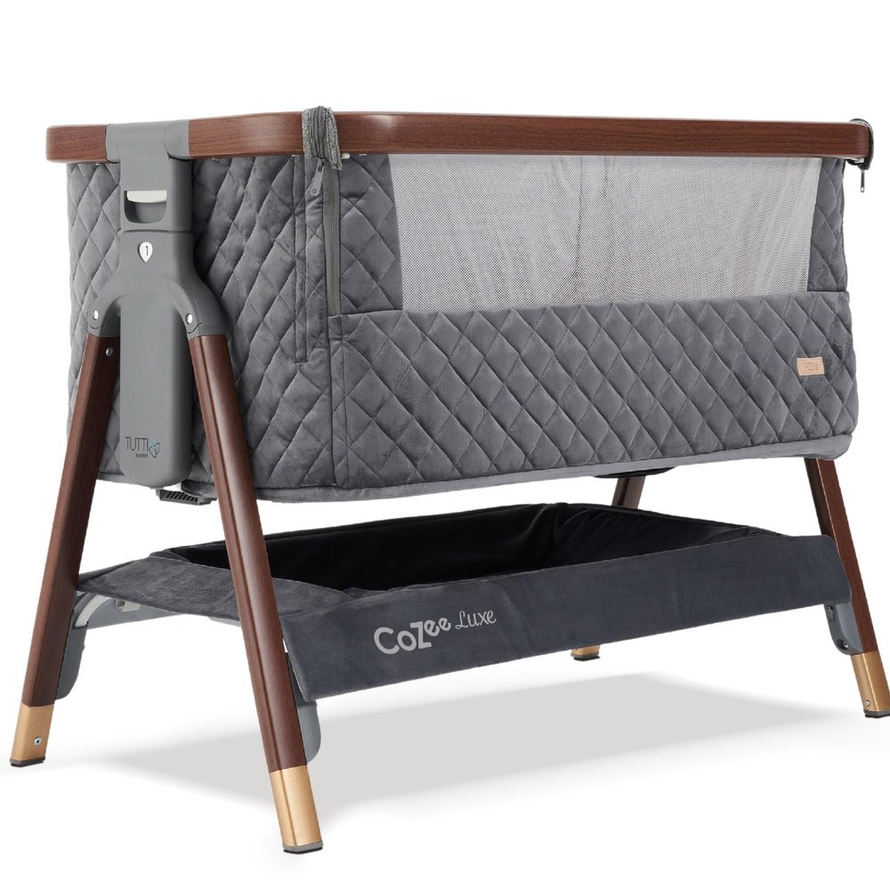 Tutti Bambini CoZee Luxe Bedside Bassinet & Sleeper for Newborns to 6 Months, Adjustable Height Portable Baby Bassinet with Mattress, Safety Straps & Travel Bag (Walnut/Slate)