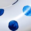 Rae Dunn x Coconut Float Indigo Polka Dot Pattern Ring Float - Adult Size Large 48 Inch Inflatable Raft & Durable Water Inner Tube - Stable Ride-On for Summer Parties & Swim Events view 3