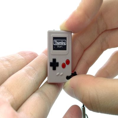 TinyCircuits Thumby Programmable Game Console Keychain Retro Gaming Fun Mini-Console, STEM Learning, USB Rechargeable, 5 Preloaded Games (Gray)