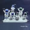 LUOZZY 4 Pcs Astronaut Figurines Cake Topper Miniature Astronaut Toys Space Cake Topper Spaceman Statues for Home Desktop Decor Space Theme Party Decorations view 4
