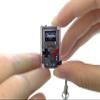 TinyCircuits | Thumby Programmable Game Console Keychain  Retro Gaming Fun Mini-Console, STEM Learning, USB Rechargeable, 5 Preloaded Games (Clear) view 1