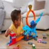 Hot Wheels City Track Set with 1 Toy Car, Race Through a Giant Loop to Defeat a Big Dinosaur, T-Rex Loop Stunt and Race Playset view 2