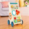 B. toys  Little Learning Steps  Wooden Activity Walker  7 Educational Activities  Learning & Walking Toy for Toddlers  Stand, Push, Walk  1 Year + view 2