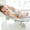 The First Years Sure Comfort Folding Baby Bather - Foldable Baby Bath Seat and Lounger for Home or On the Go - for Sink or Tub Use - Non-Slip Seat - For Up to 15 Lbs view 2