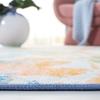 SAFAVIEH Washable Rug Paint Brush Collection - 6'7" Round, Navy & Orange, Slip Resistant & Easy to Clean, Ideal for Living Room, Bedroom, Nursery, Kids Playroom, Dining Space (PTB157N) view 4