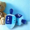 Aviv Judaica Pack of 6 Stuffed Plush Dreidels with Rattle for Hanukkah - 6" x 3" Embroidered with The Hebrew Drydel Letters and English Transliteration My First Chanukah Driedel Gift view 3