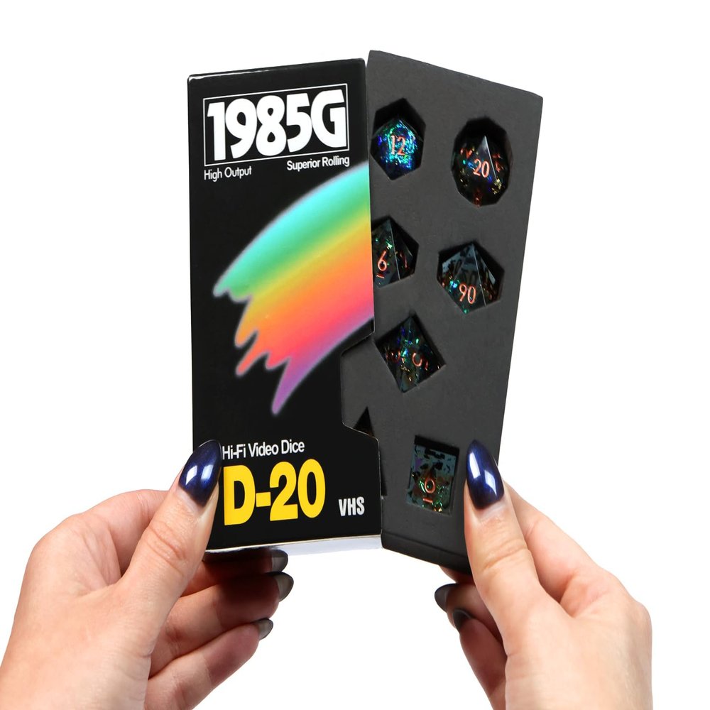 1985 Games Sharp Edge DND Dice Set Starstorm Polyhedral Dice in Retro VHS Box 5E TTRPG Dice Set Tabletop RPG Accessory (Set of 7)