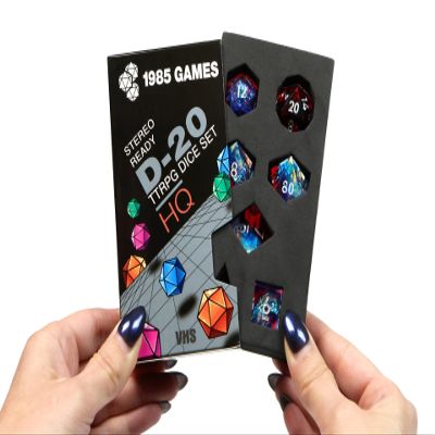 1985 Games Sharp Edge DND Dice Set Plasmic Punch Polyhedral Dice in Retro VHS Box TTRPG Dice Set Tabletop RPG Accessory (Set of 7)